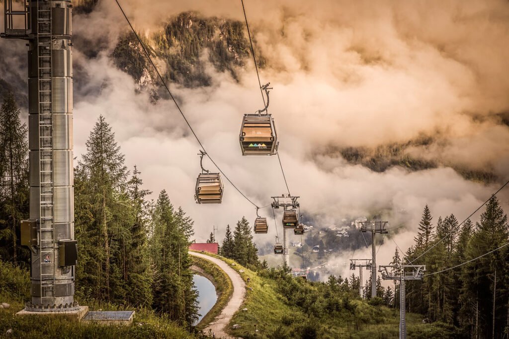 Jennerbahn cable cars above foggy Bavarian mountains near Königssee, Germany